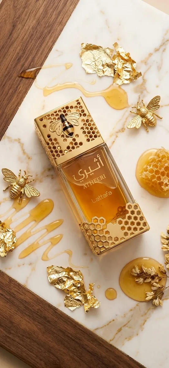 Perfume Atheeri Lattafa com tampa de favo de mel dourada · 100 ml